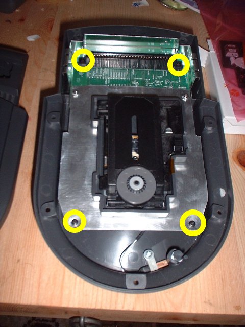 CD Unit with top cover removed, PCB mounting screws marked